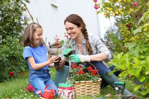 Gardener working in a Blackwall terraced garden