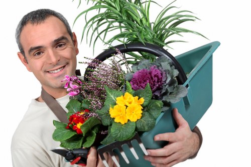 Eco-friendly garden clearance practices being implemented by professionals.